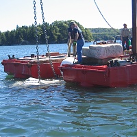 The heavy ground chain links directly to the hitch rod.  No shackle required.