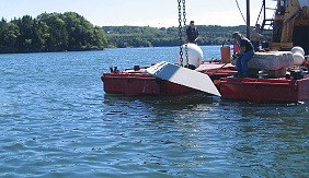 HMS 8000 is lowered into the waters of Smith Cove, near Castine, Maine.