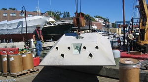 HMS 8000 Low Profile mooring is hoisted onto barge at Maine Maritime Academy.